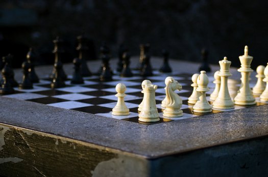 Are there more possible legal moves in chess than there are atoms