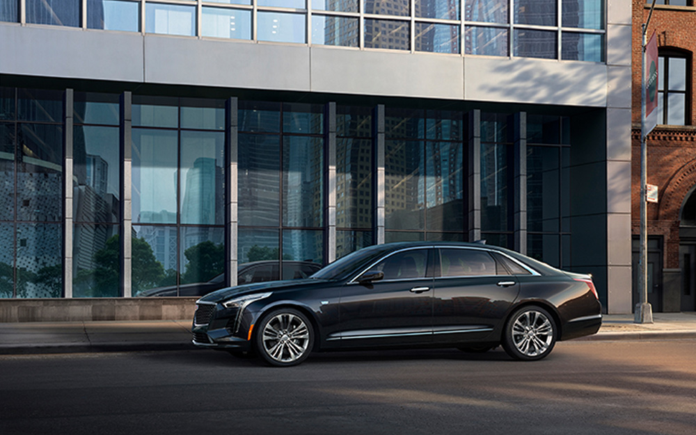 Black car using the super cruise semi-autonomous driving mode by Cadillac