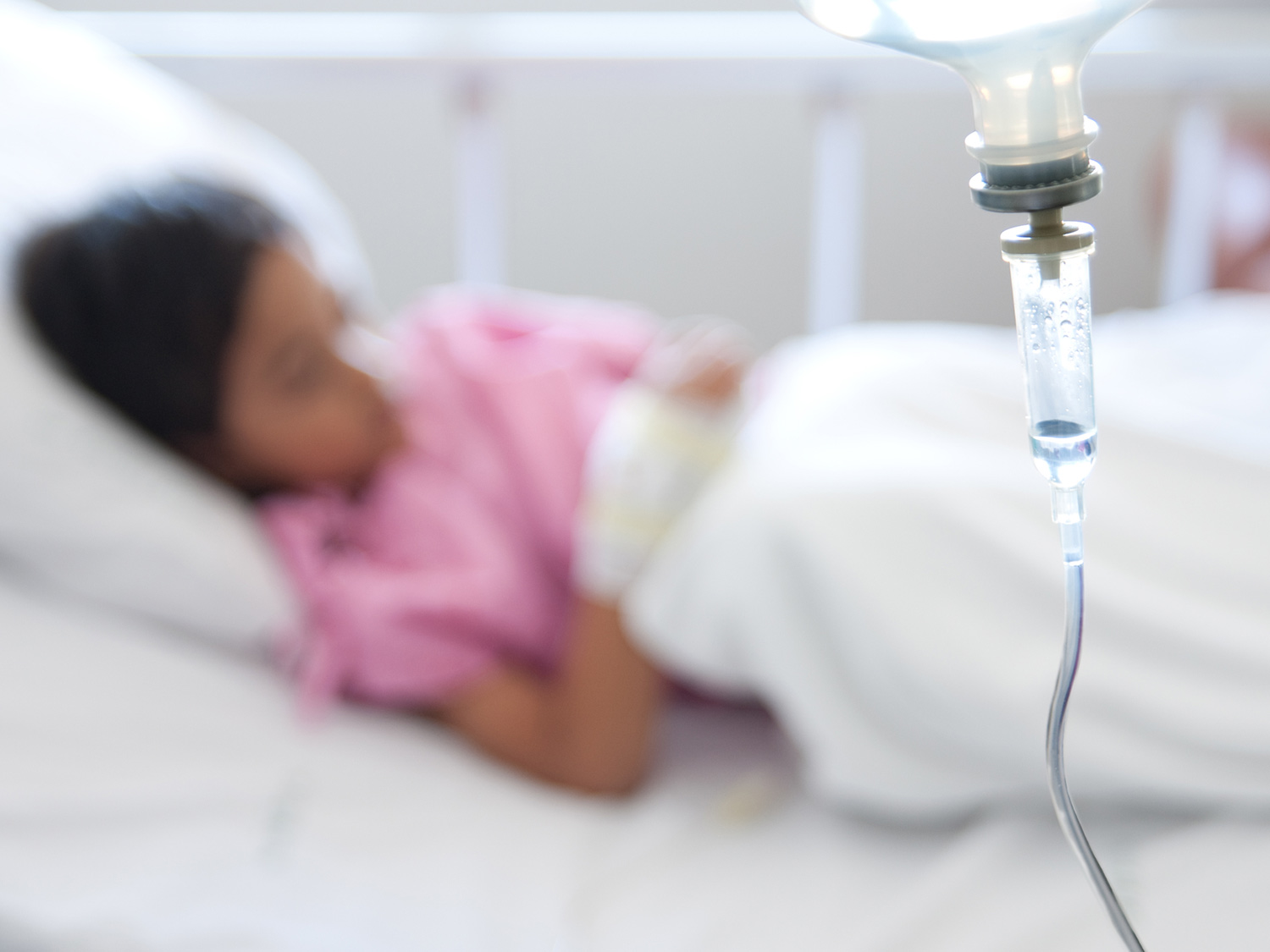 child in hospital bed