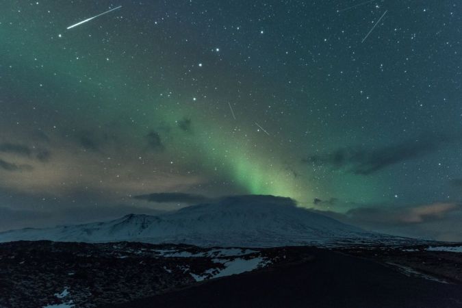 Meteor shower and Northern Lights over Snæfellsnes glacier, Iceland