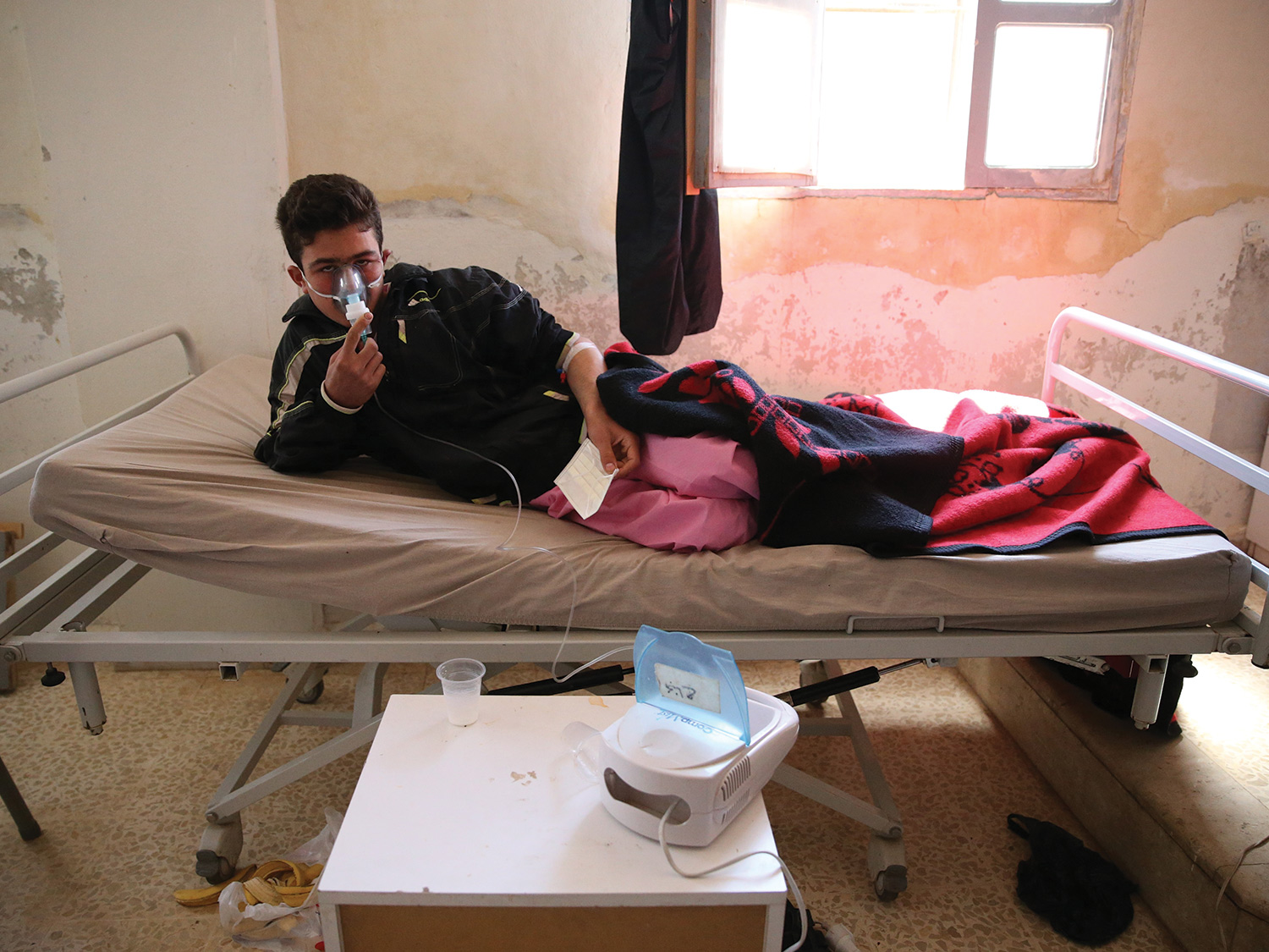 young man with oxygen mask