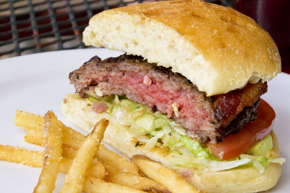 rare hamburger and fries