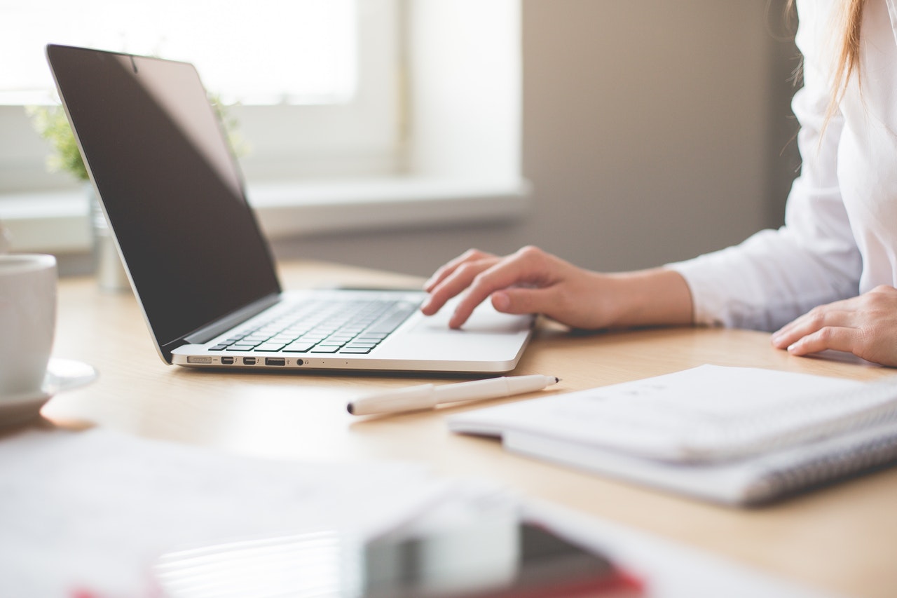 Women typing on laptop