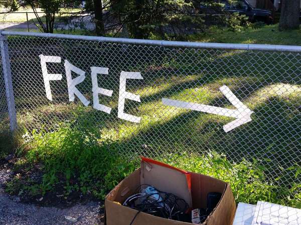 a sign made of tape that points to free stuff