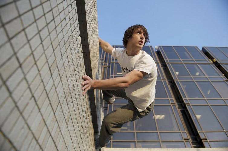 man against the wall parkour