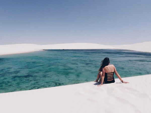 woman sitting on the beach