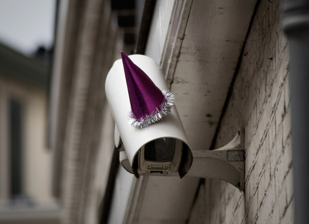 For George Orwell’s Birthday, Artists Top Surveillance Cams With Party Hats