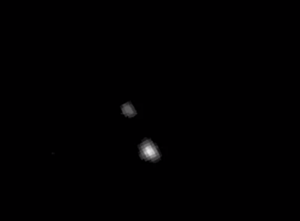 New Horizons Spacecraft, En Route To Pluto, Sends Back First Images Of The Dwarf Planet