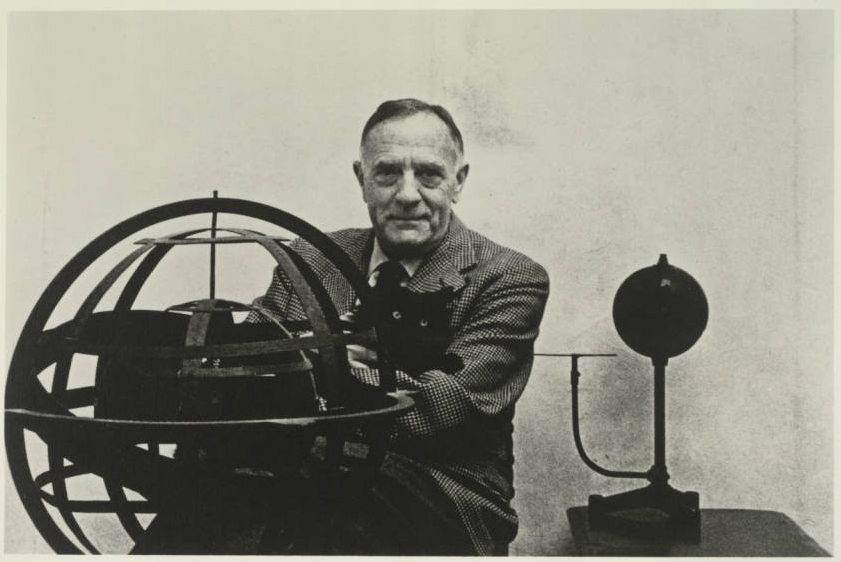 Edwin Hubble holds his cat, Nicolas Copernicus