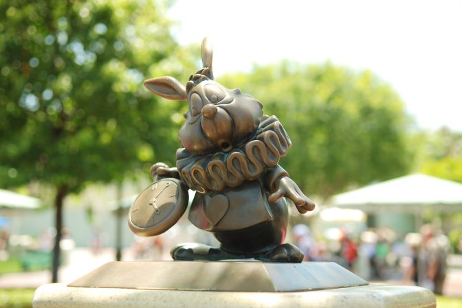 Disneyland bronze sculpture of white rabbit alice in wonderland