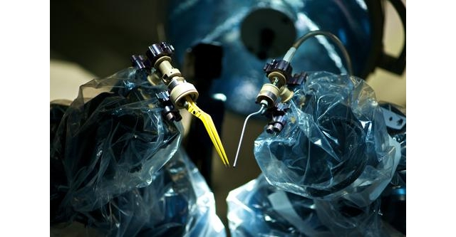 The Microscopic Future of Surgical Robotics