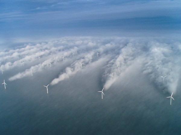 Wind Turbines Leave Clouds and Energy Inefficiency in Their Wake