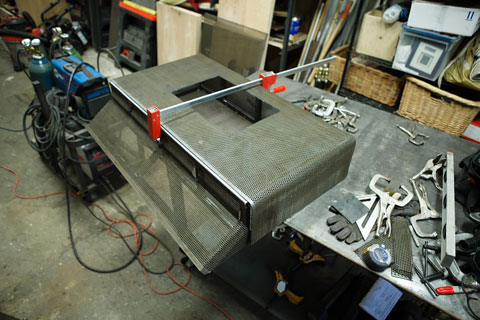 The steel housing for an arcade box.