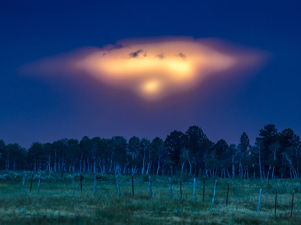 bright UFO in the night sky