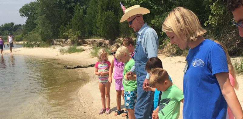 Bernie Fowler walks into Maryland’s Patuxent River