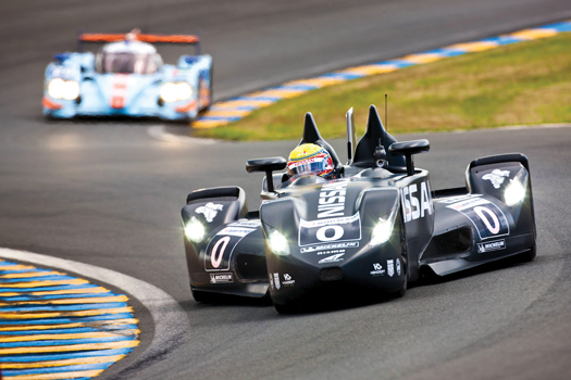 Michael Krumm pilots the car around the Circuit de Le Sarthe.