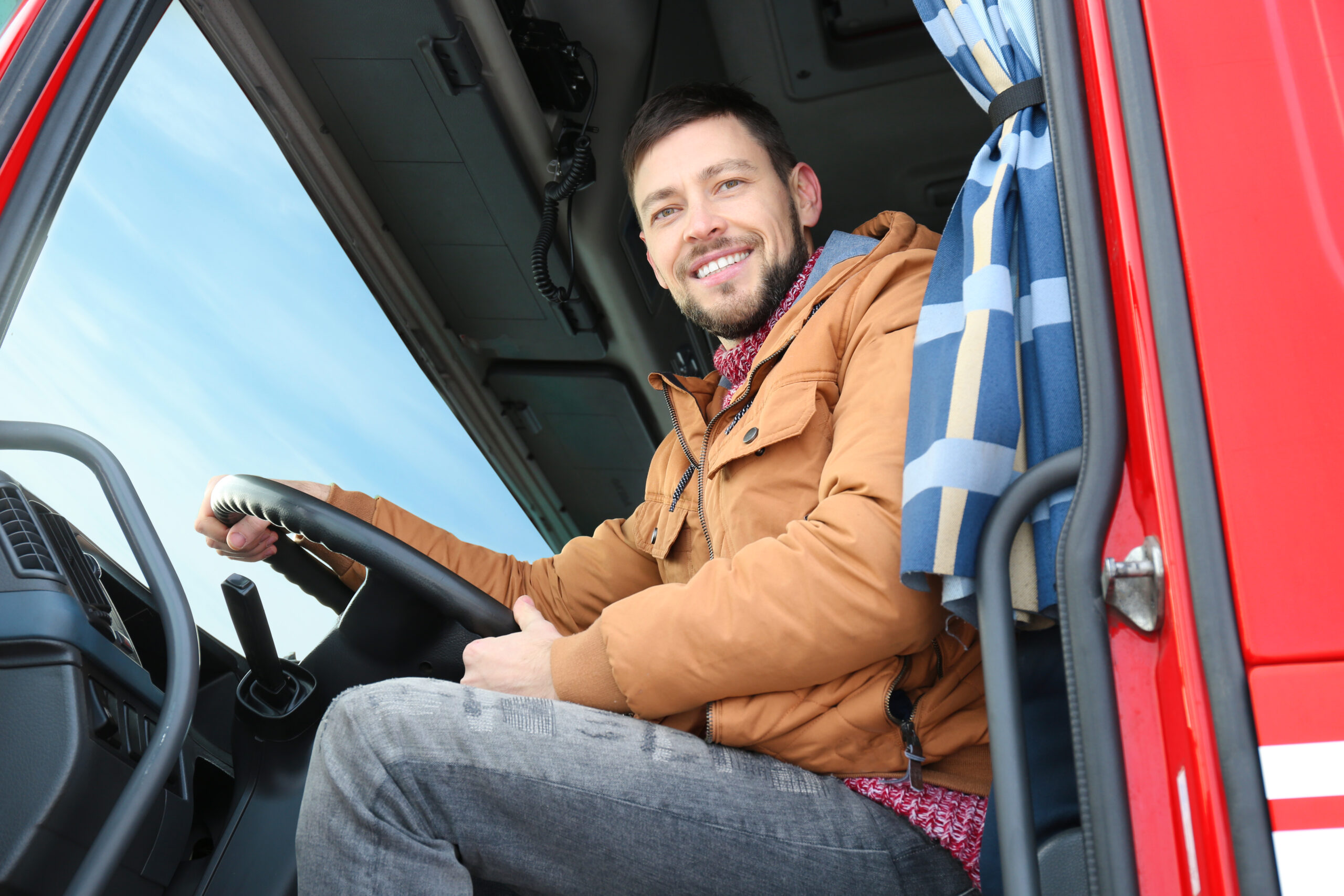 man in a truck cab