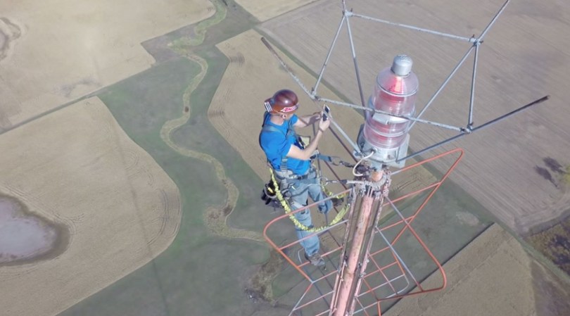 Drone Films Man Changing A Lightbulb 1,500 Feet Above The Ground