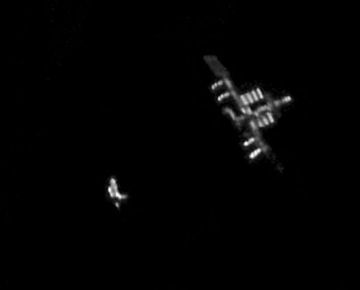 An Amazing Pic of Discovery Docking with the ISS, Taken from Earth