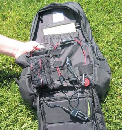 The inside of a backpack that's also a DIY WiFi hotspot.