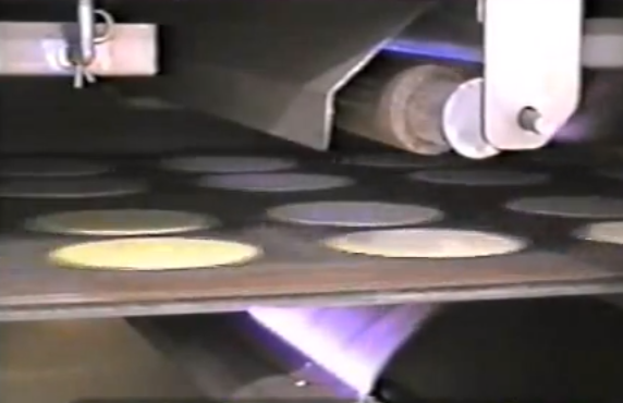 Industrial Food Machine Video of the Day: Toasting and Frying Taco Shells