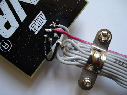 Some white wires connected to a microcontroller.