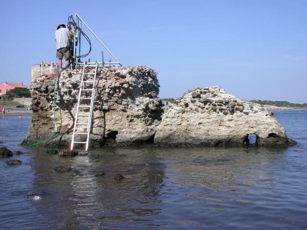 drilling into seawall