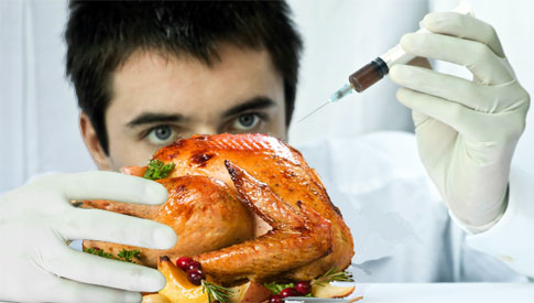 scientist injecting turkey