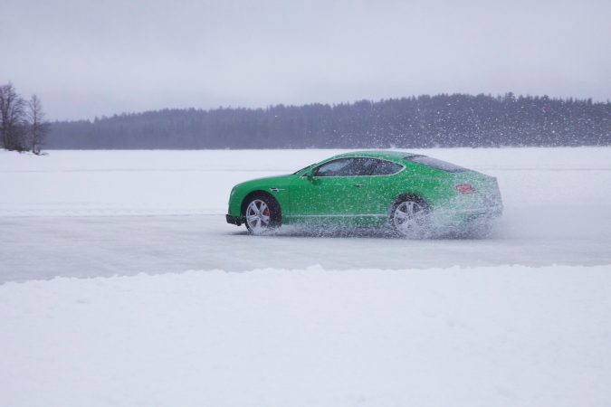 Drifting Luxury Cars Atop A Frozen Lake In Finland
