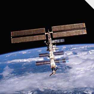 Is the International Space Station visible to the naked eye in the night skies?