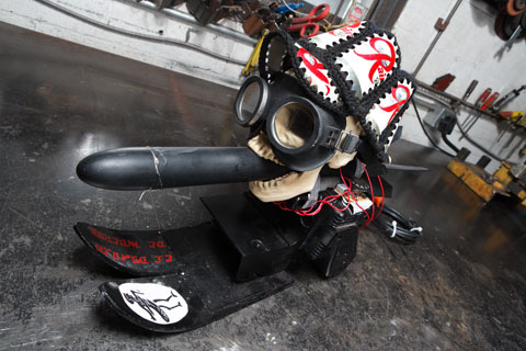 A rocket-powered belt sander with a skull on it.