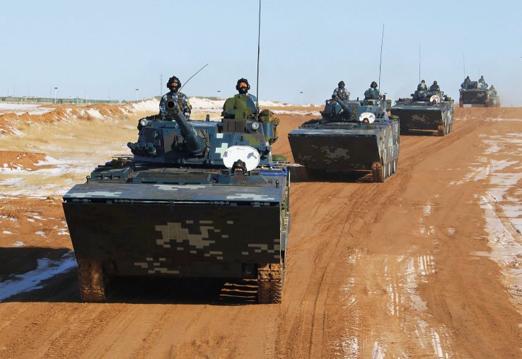 4 tanks on a road