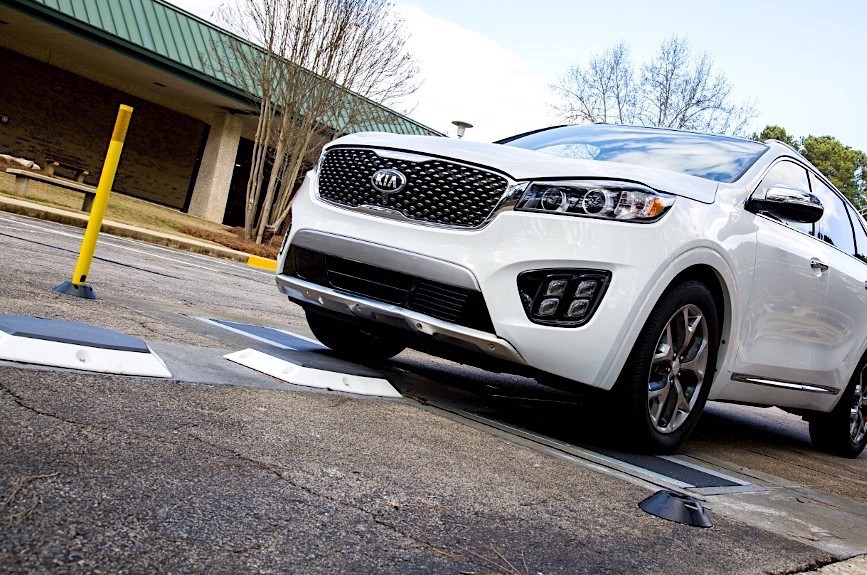 a car rolls over sensors on the road