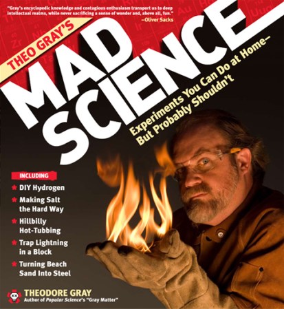 Theo Gray's Mad Science book cover, showing Gray with a thick glove that's on fire.