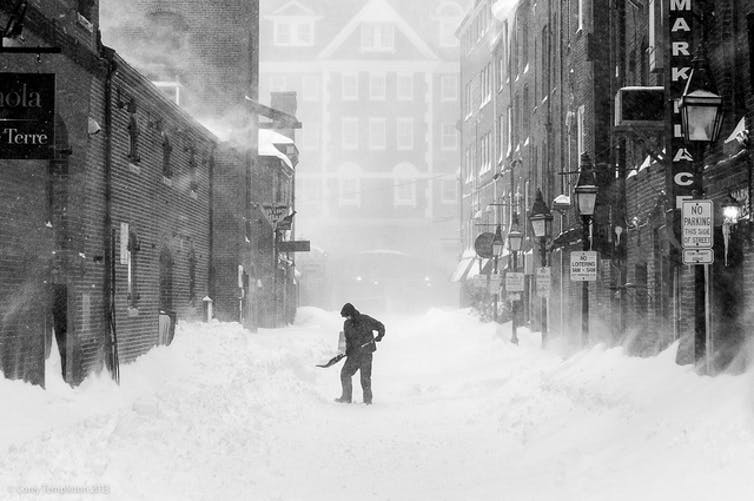 snow shoveling in town