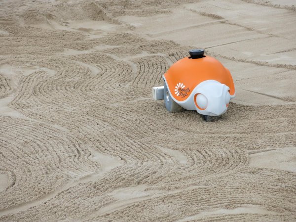 Disney Creates Beach-Dwelling Robot That Draws Adorable Cartoons In Sand