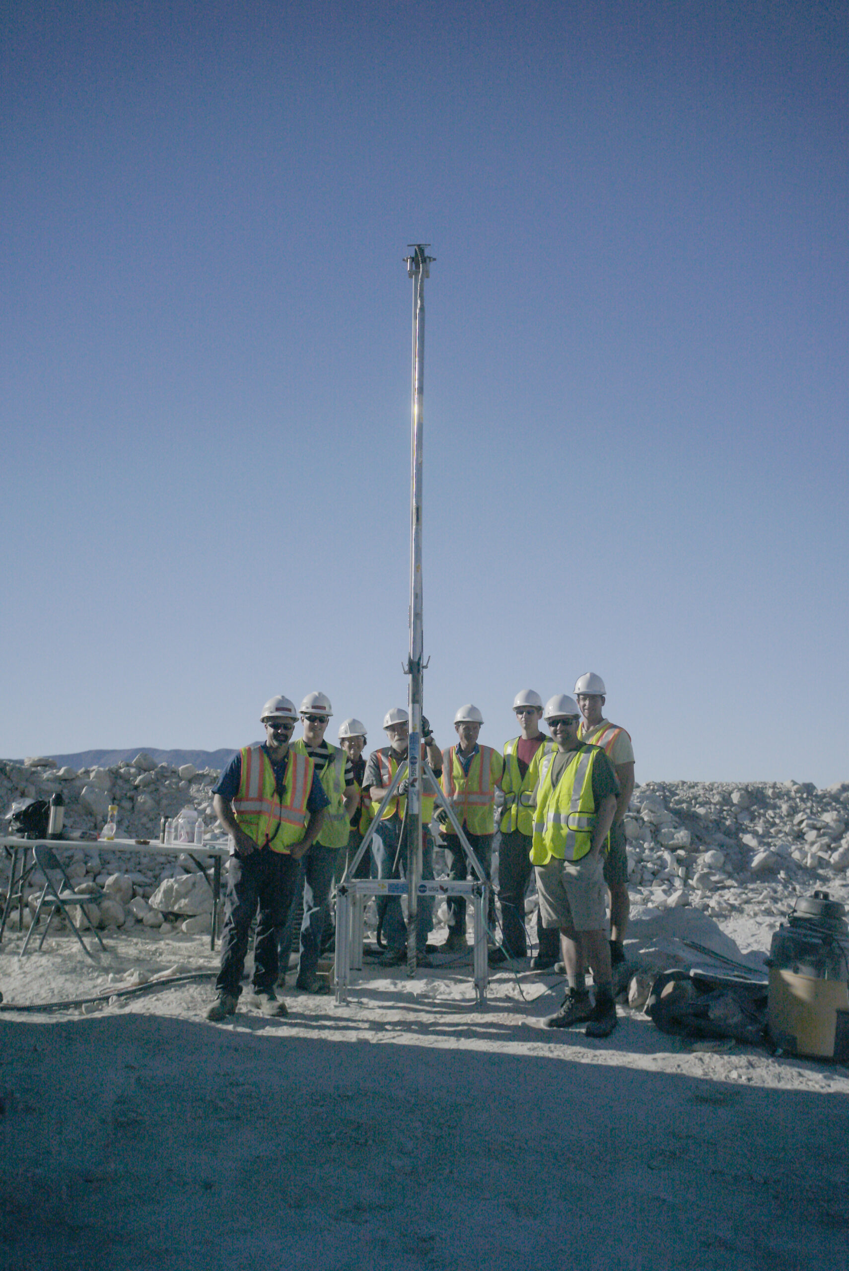 People standing around Planetary Deep Drill