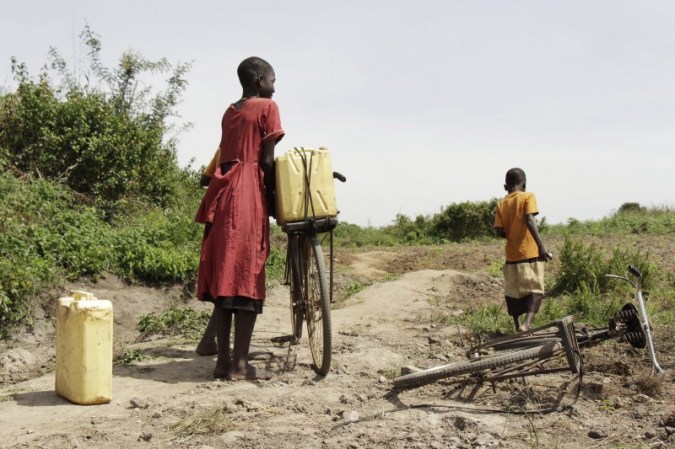 children carrying water