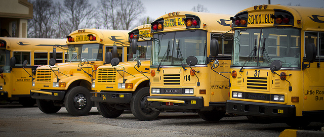 school buses in parking lots