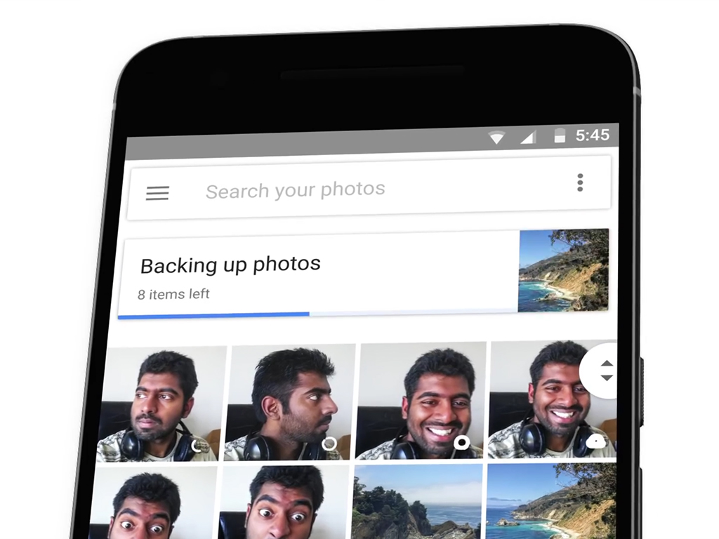 A phone using Google Photos to back up photos to the cloud.