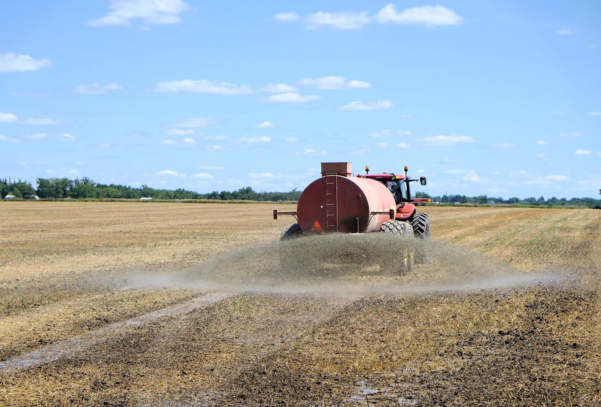 fertilizer being sprayed on field