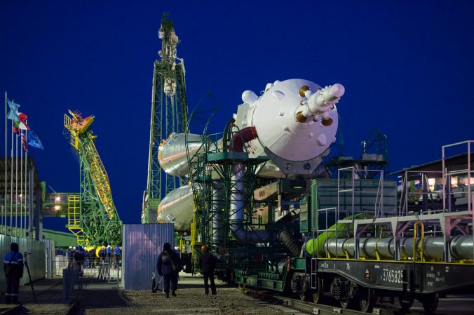 Soyuz rocket is wheeled to launchpad