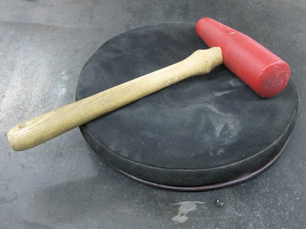 Video: Make a Metal Bowl with a Tree Stump and a Mallet