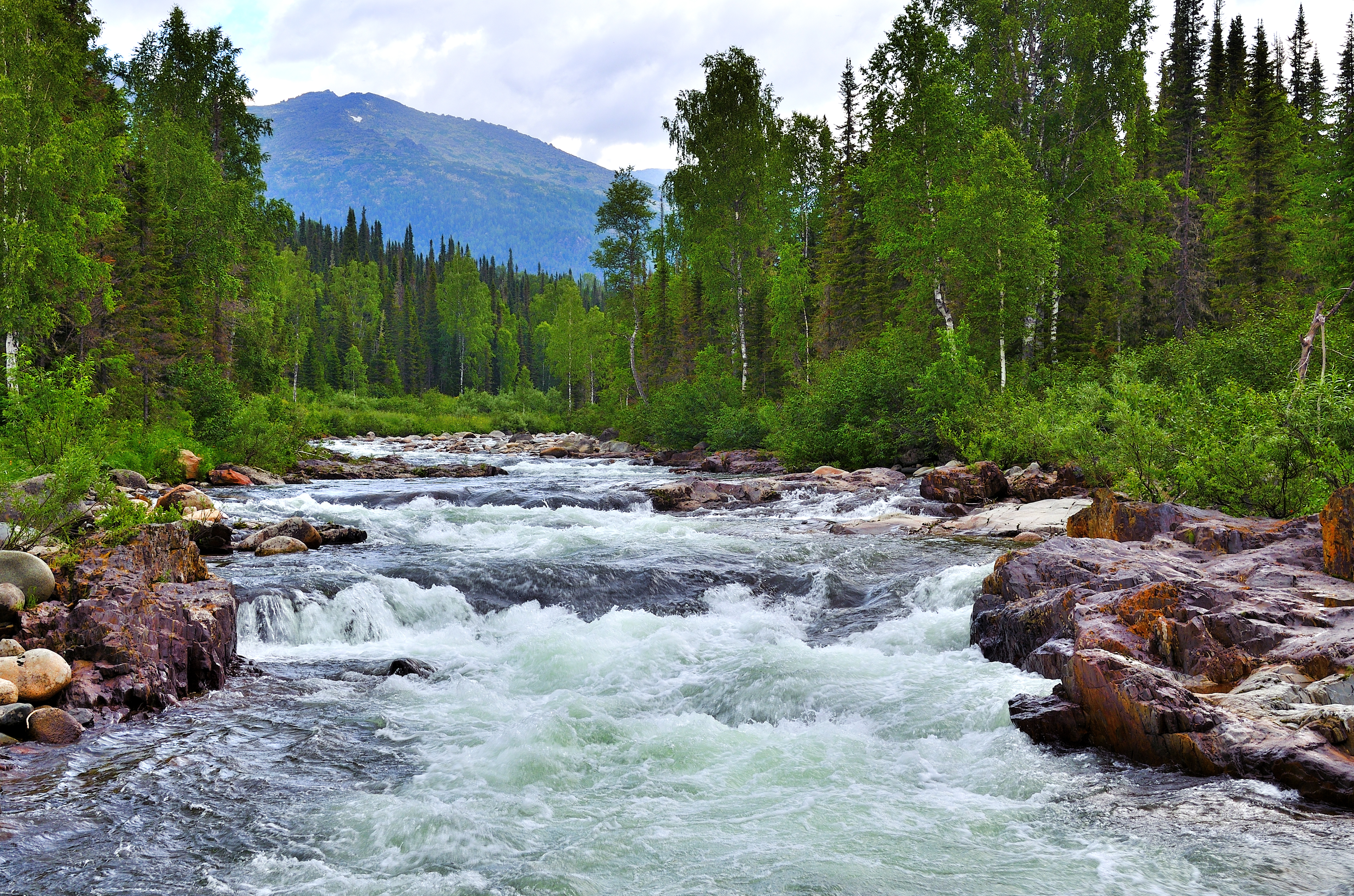 a river with rocks around it