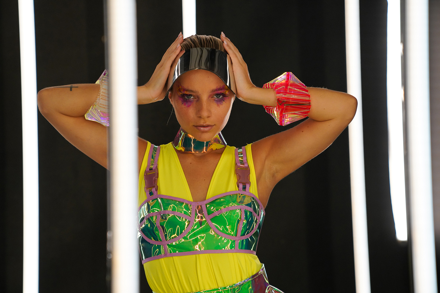 woman in colorful clothing and makeup