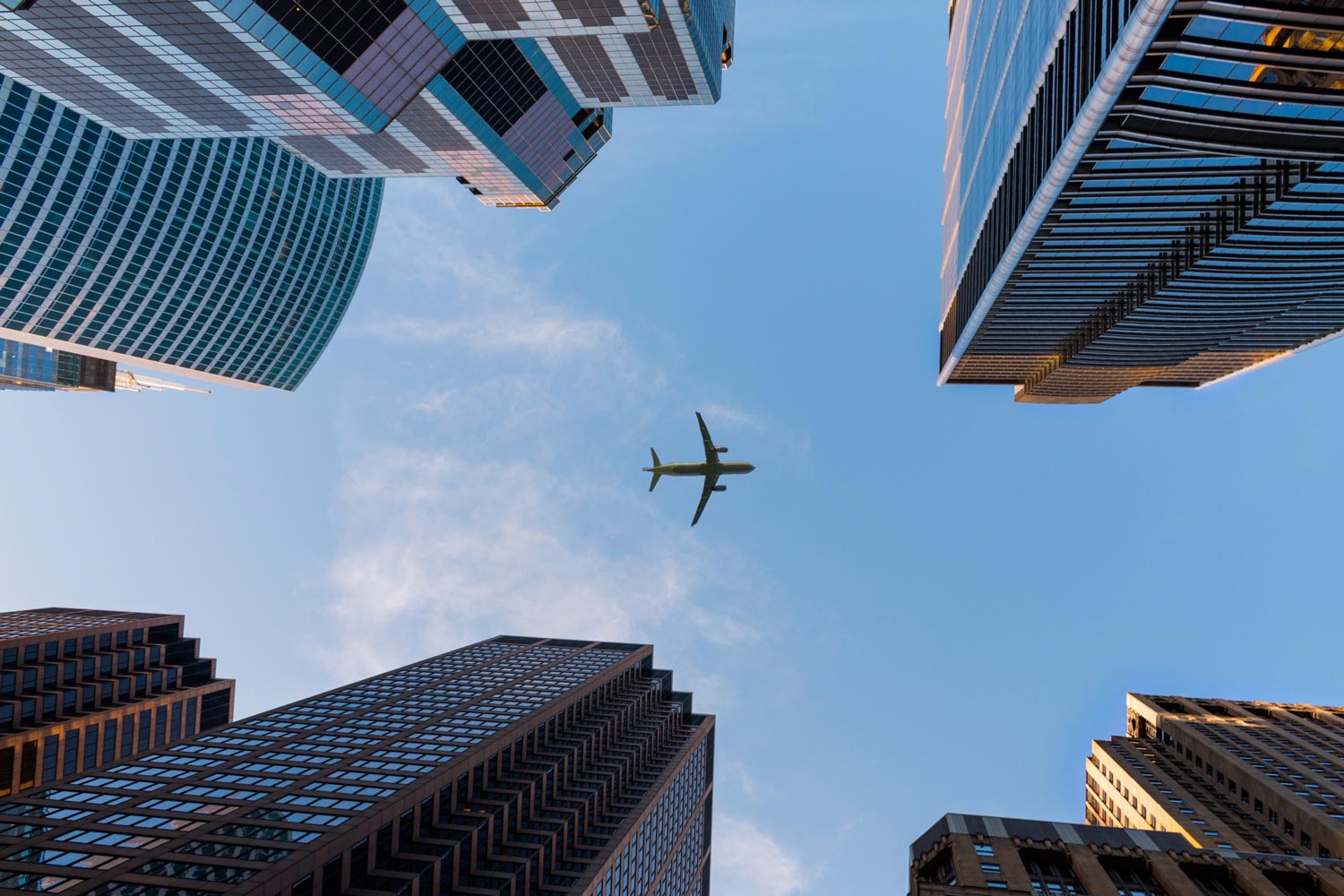 An airplane flying above Chicago