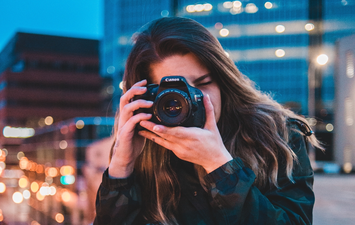 woman taking a photograph