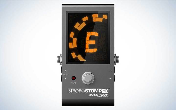  A Peterson StroboStomp HD guitar tuning pedal on a plain background