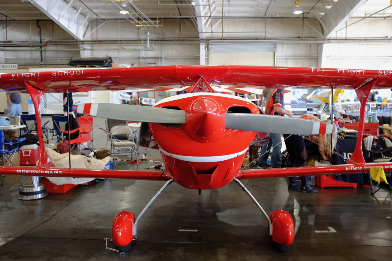 Pitts S-1S aerobatic red biplane from the front