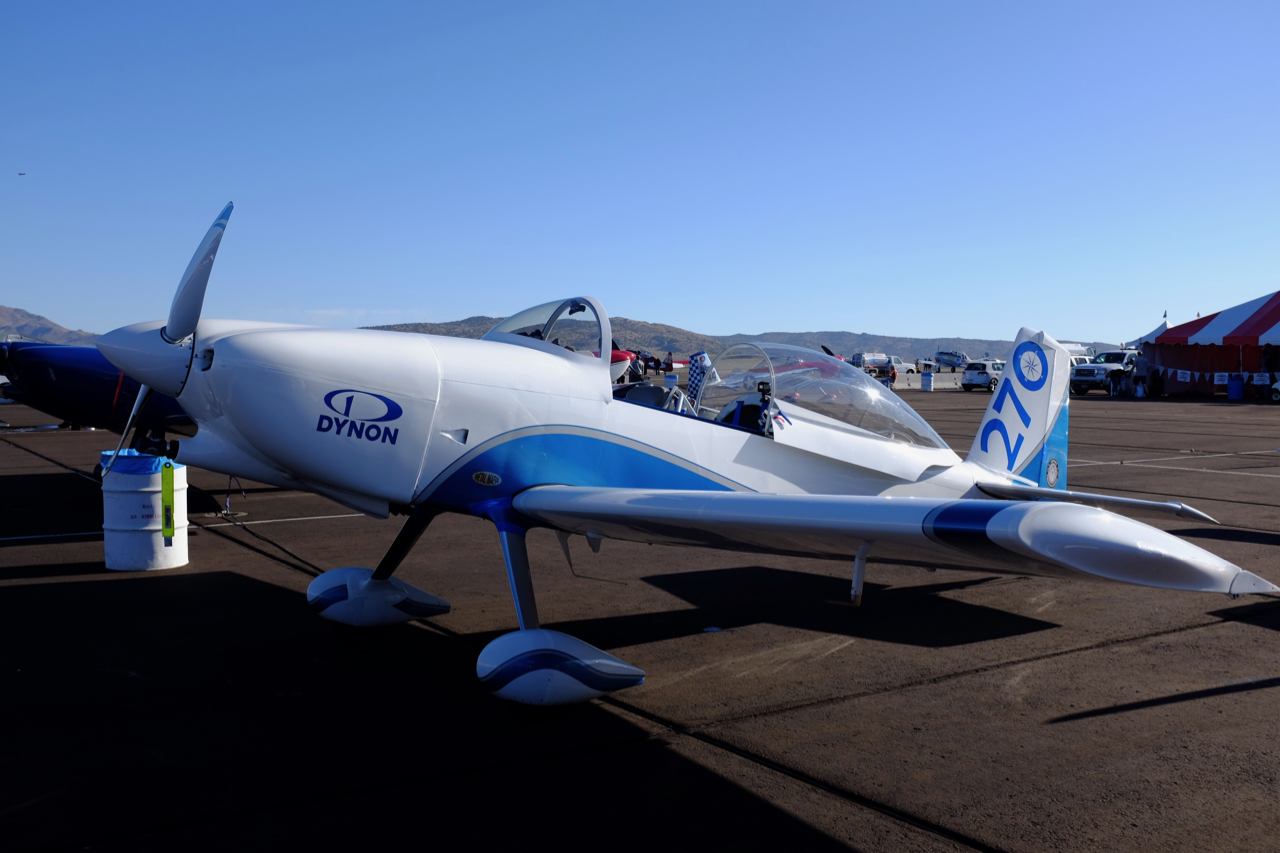 small racing airplane on the tarmac